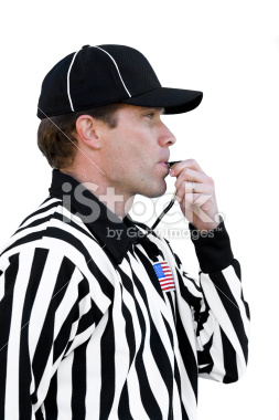 stock-photo-7871596-referee-blowing-whistle